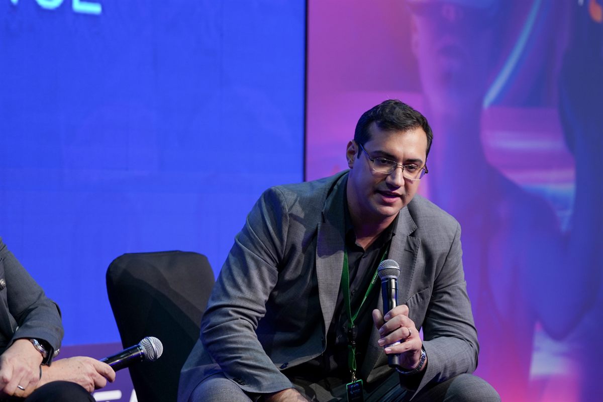 Speaking participation during a technology event.